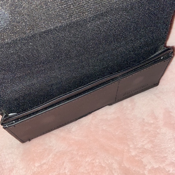 Stronden Black Phone Case. Never used
Fits iPhone 11. 2 pockets inside. - Picture 7 of 9